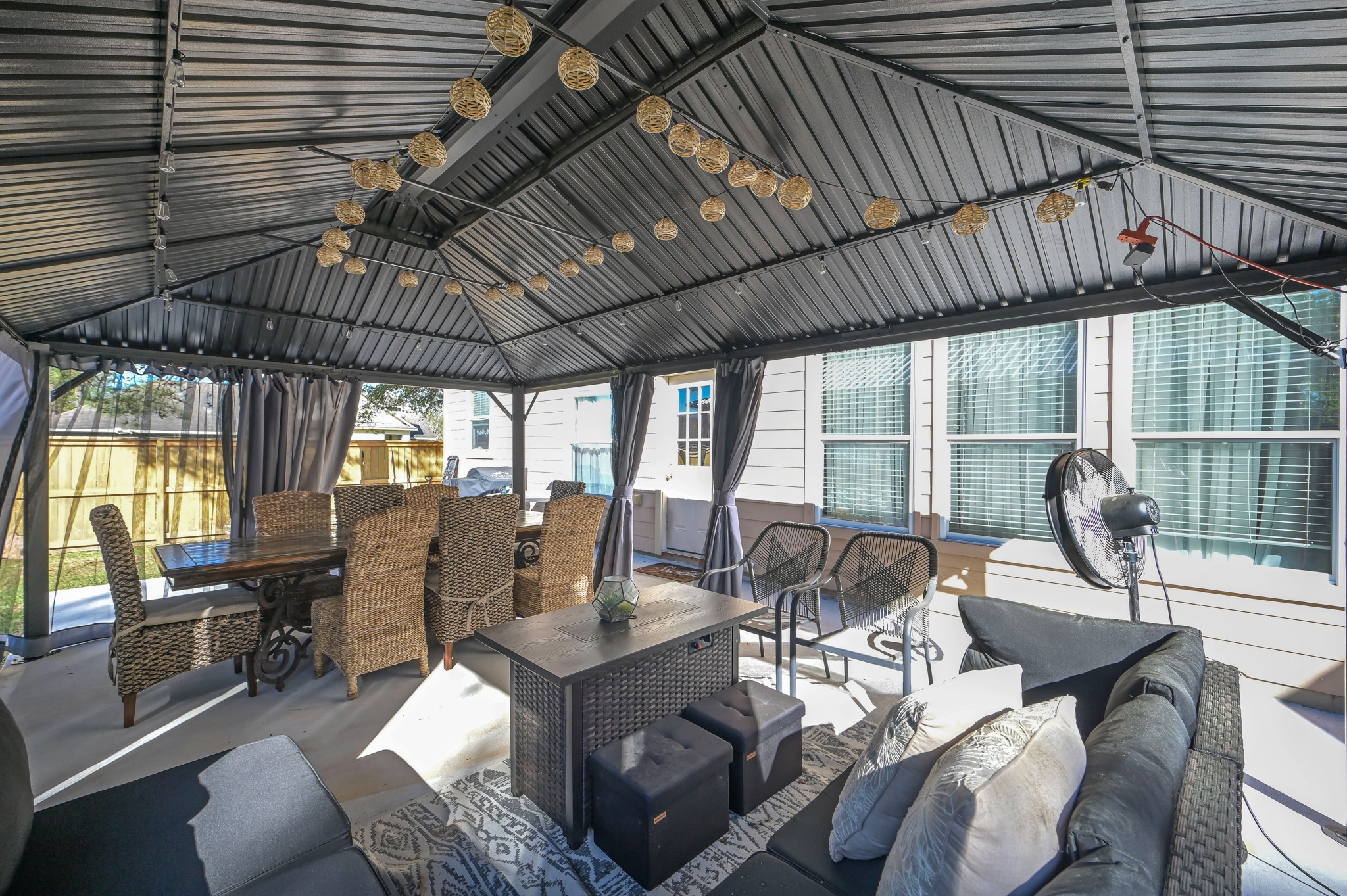 1000 Arbor Way Conroe, TX 77303 - Photo 26 of 29 Spacious outdoor gazebo with a metal roof. Ample dining space as well as comfortable seating area. Perfect for entertaining or relaxing in privacy.