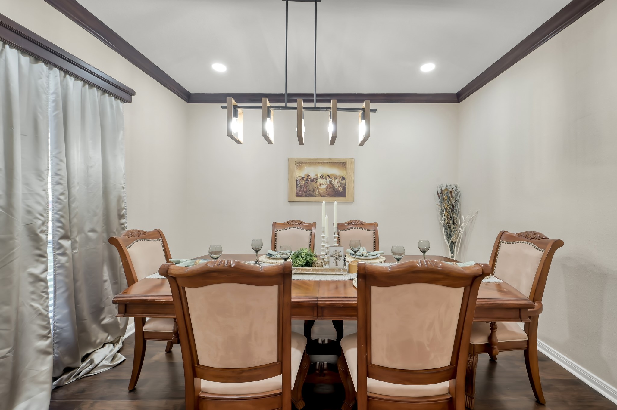 1000 Arbor Way Conroe, TX 77303 - Photo 5 of 29 This dining room features elegant lighting, and neutral walls and can also be used as an office with the newly added french doors.