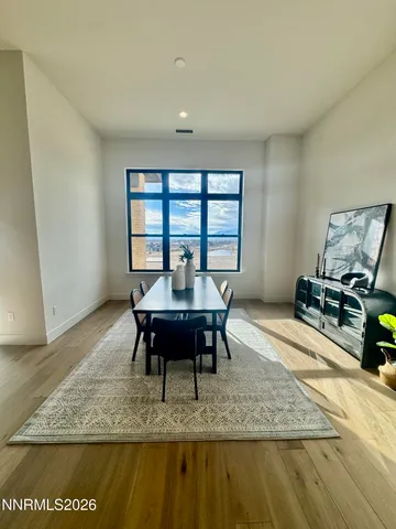 a bathroom with a sink and a large mirror