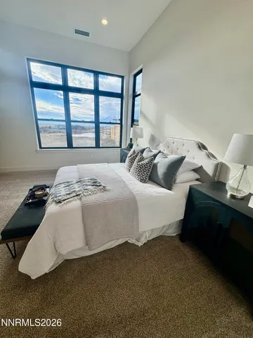 a bathroom with a sink toilet and mirror