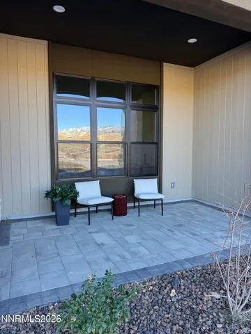 a living room with a couch and window