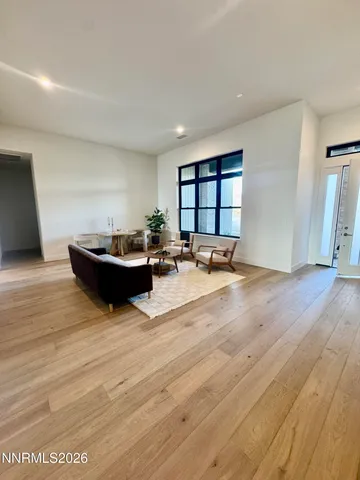 a kitchen with kitchen island stainless steel appliances and wooden cabinets