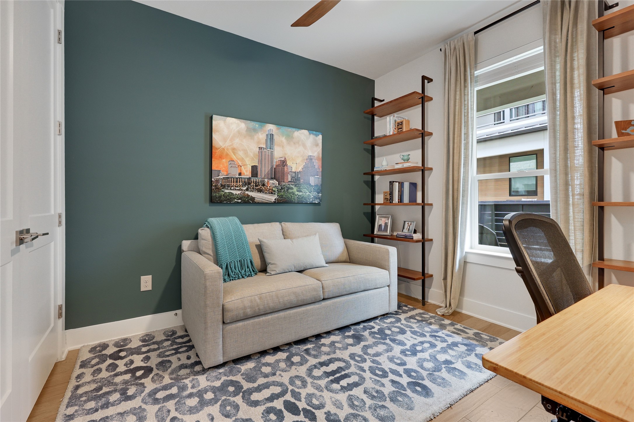 3904 Sightline Street, Unit 125 Austin, TX 78731 - Photo 5 of 37 a living room with furniture and a flat screen tv