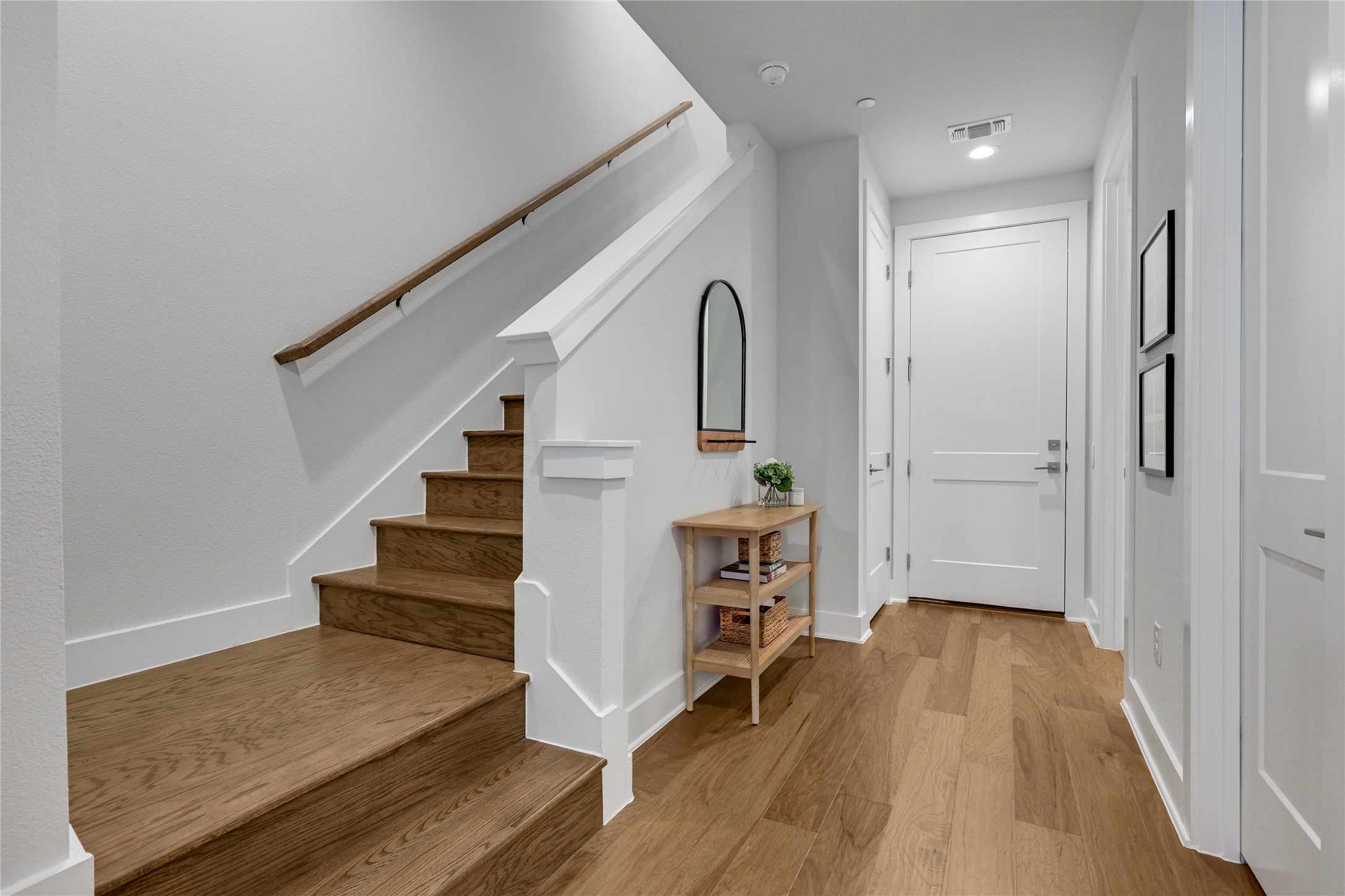 3904 Sightline Street, Unit 125 Austin, TX 78731 - Photo 7 of 37 a view of entryway with wooden floor