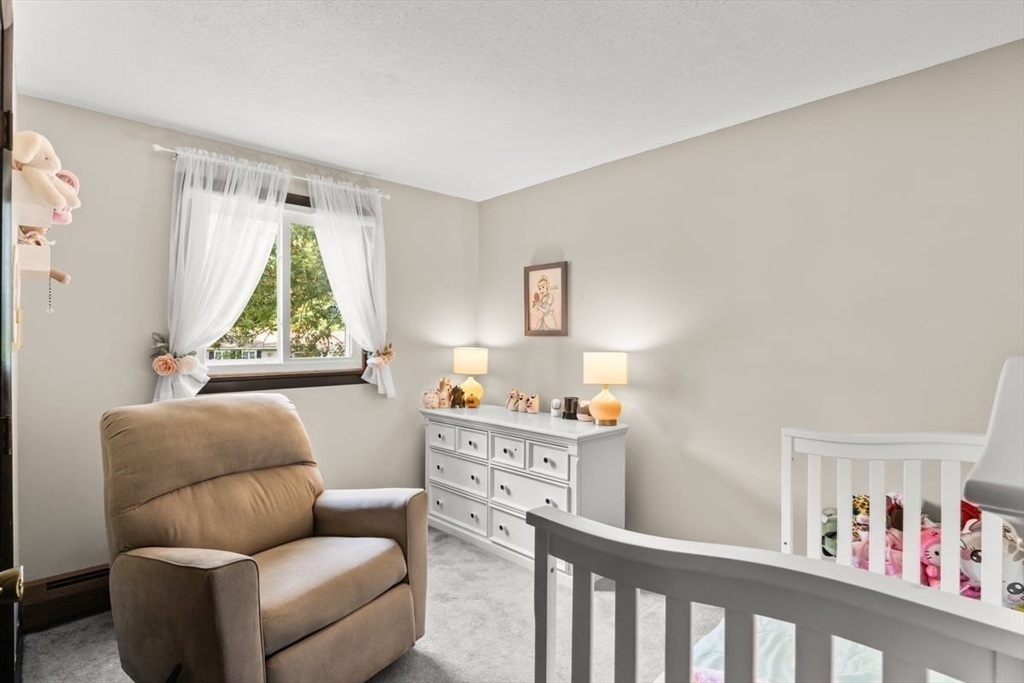 10 Dean Street Freetown, MA 02702 - Photo 13 of 26 a bedroom with furniture and a window