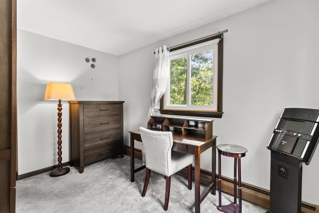 10 Dean Street Freetown, MA 02702 - Photo 15 of 26 a view of a workspace with furniture and a window