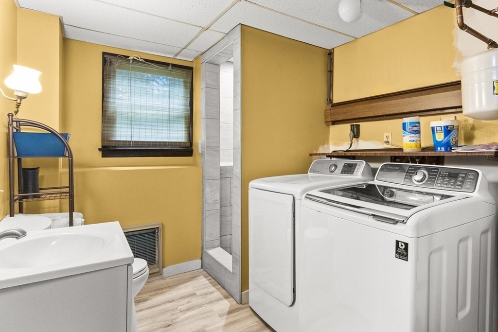 10 Dean Street Freetown, MA 02702 - Photo 20 of 26 a utility room with dryer and washer