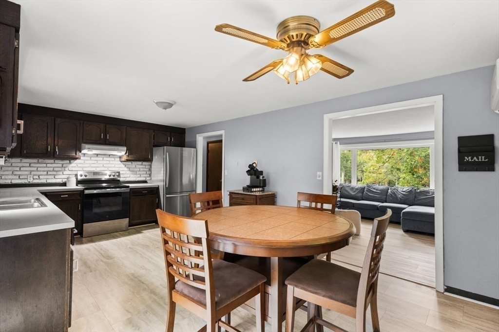 10 Dean Street Freetown, MA 02702 - Photo 5 of 26 a view of a dining room with furniture window and outside view