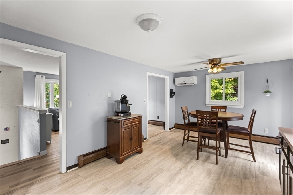 10 Dean Street Freetown, MA 02702 - Photo 6 of 26 a view of a dining room with furniture window and wooden floor