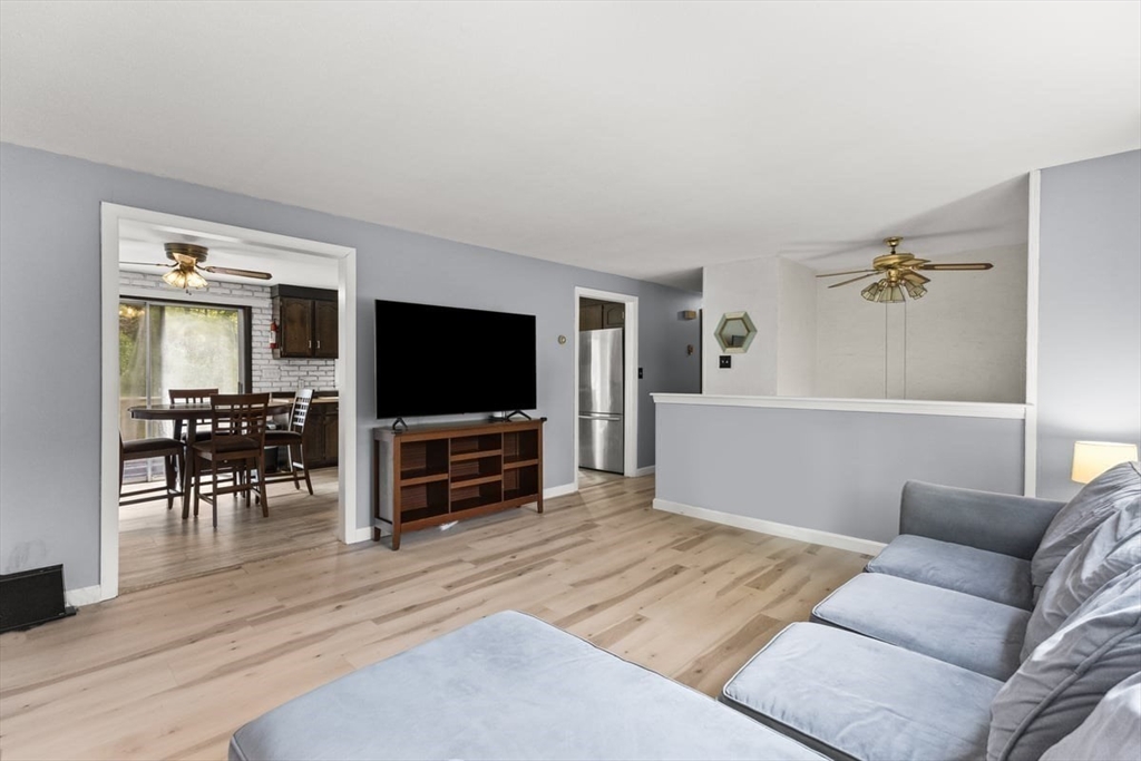 10 Dean Street Freetown, MA 02702 - Photo 7 of 26 a living room with furniture and a flat screen tv