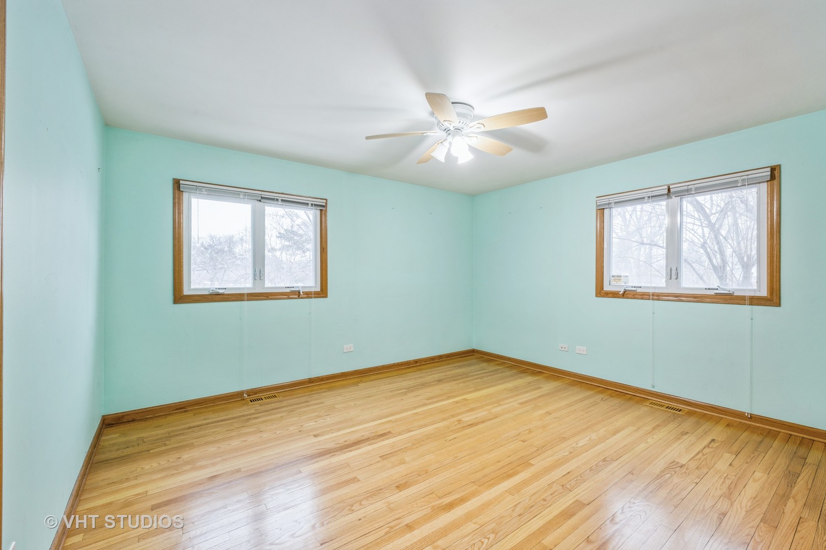 6310 Thurlow Street Willowbrook, IL 60527 - Photo 15 of 34 a view of an empty room with window and wooden floor