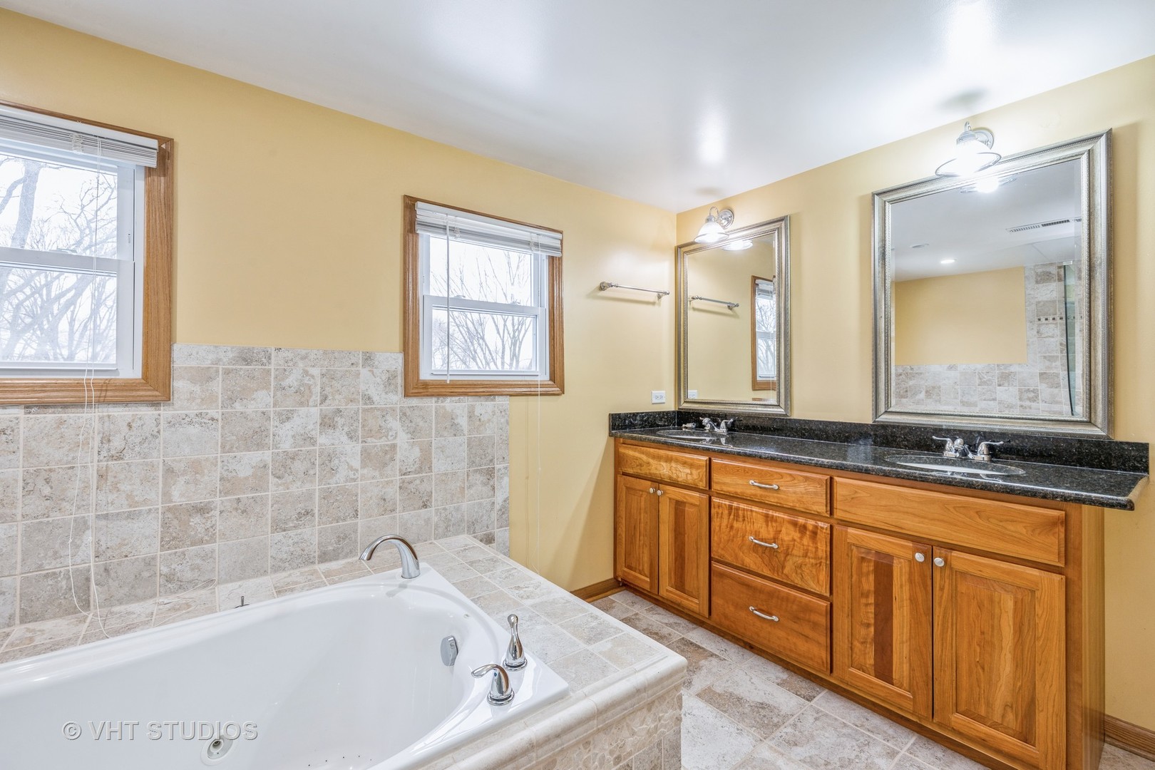 6310 Thurlow Street Willowbrook, IL 60527 - Photo 23 of 34 a bathroom with sink bathtub and double vanity