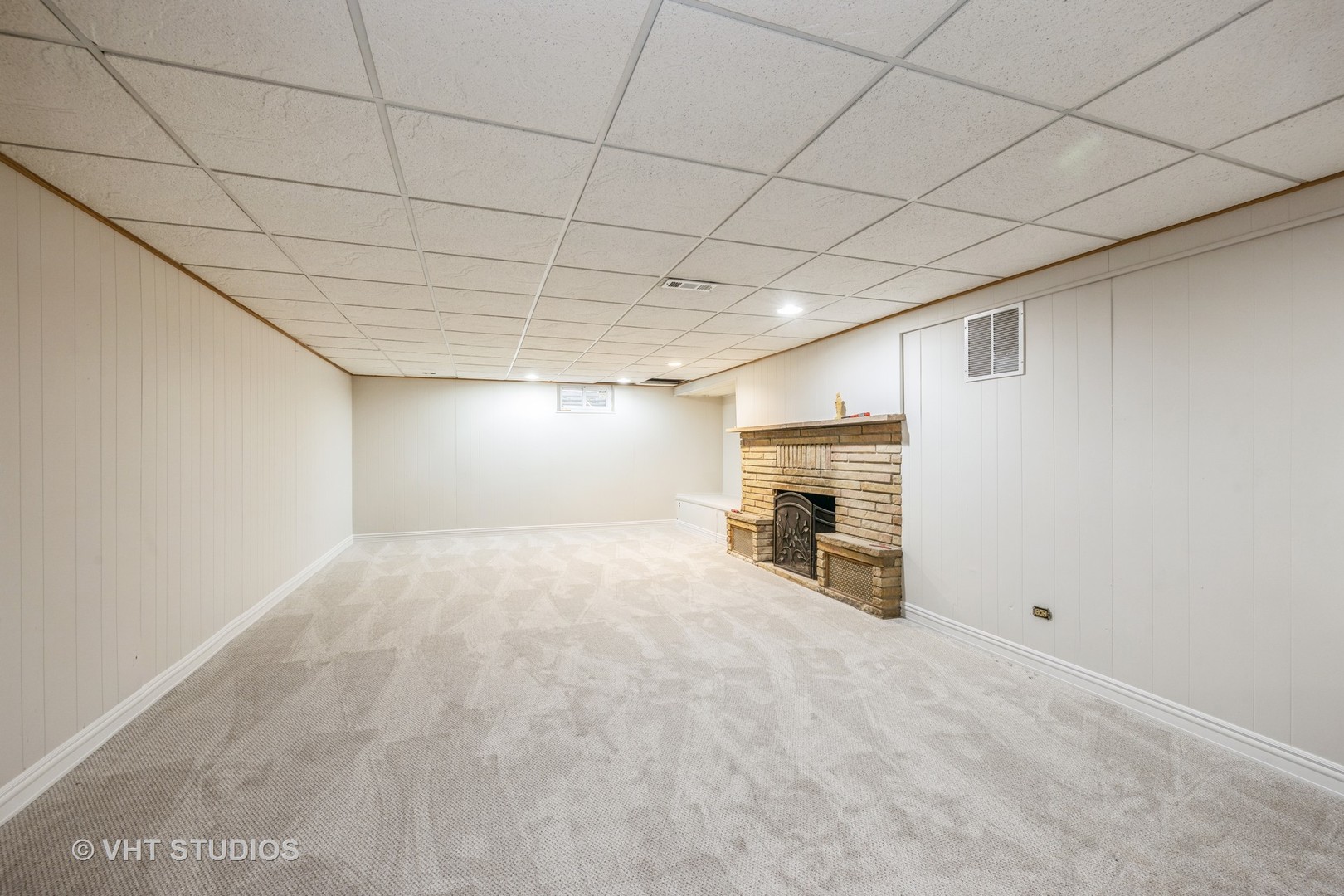 6310 Thurlow Street Willowbrook, IL 60527 - Photo 25 of 34 a view of empty room with a fireplace