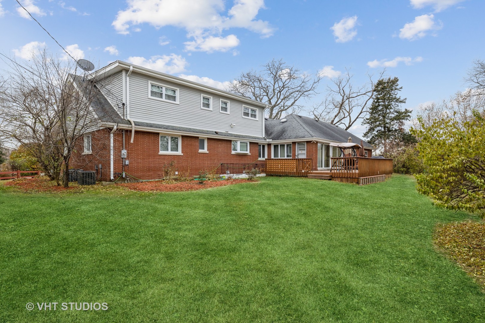 6310 Thurlow Street Willowbrook, IL 60527 - Photo 27 of 34 a front view of house with yard and green space