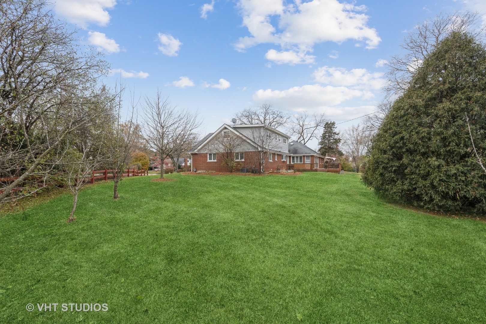 6310 Thurlow Street Willowbrook, IL 60527 - Photo 28 of 34 a view of a house with a back yard