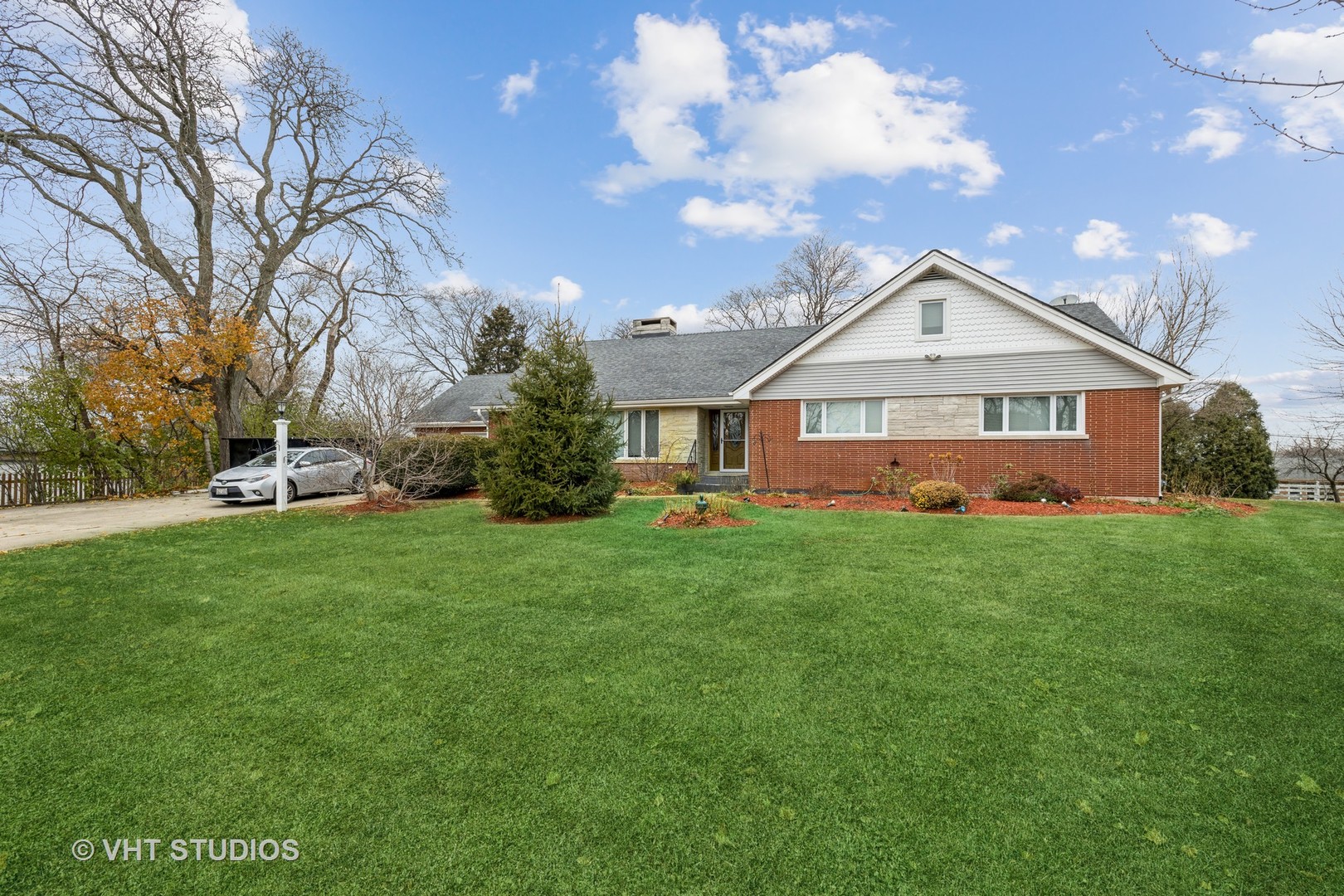 6310 Thurlow Street Willowbrook, IL 60527 - Photo 3 of 34 a view of a house with a yard