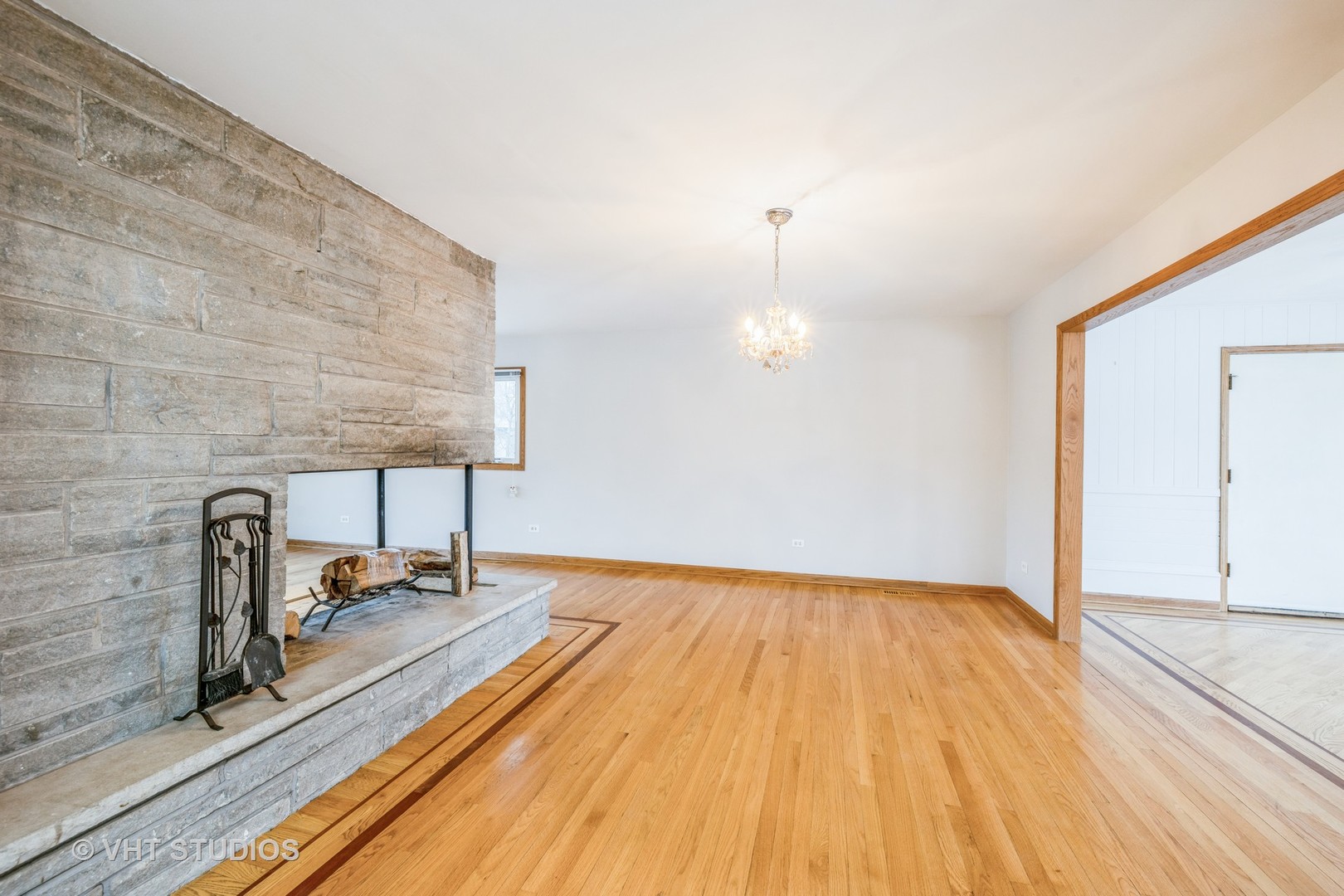 6310 Thurlow Street Willowbrook, IL 60527 - Photo 8 of 34 a view of a room with wooden floor and fence