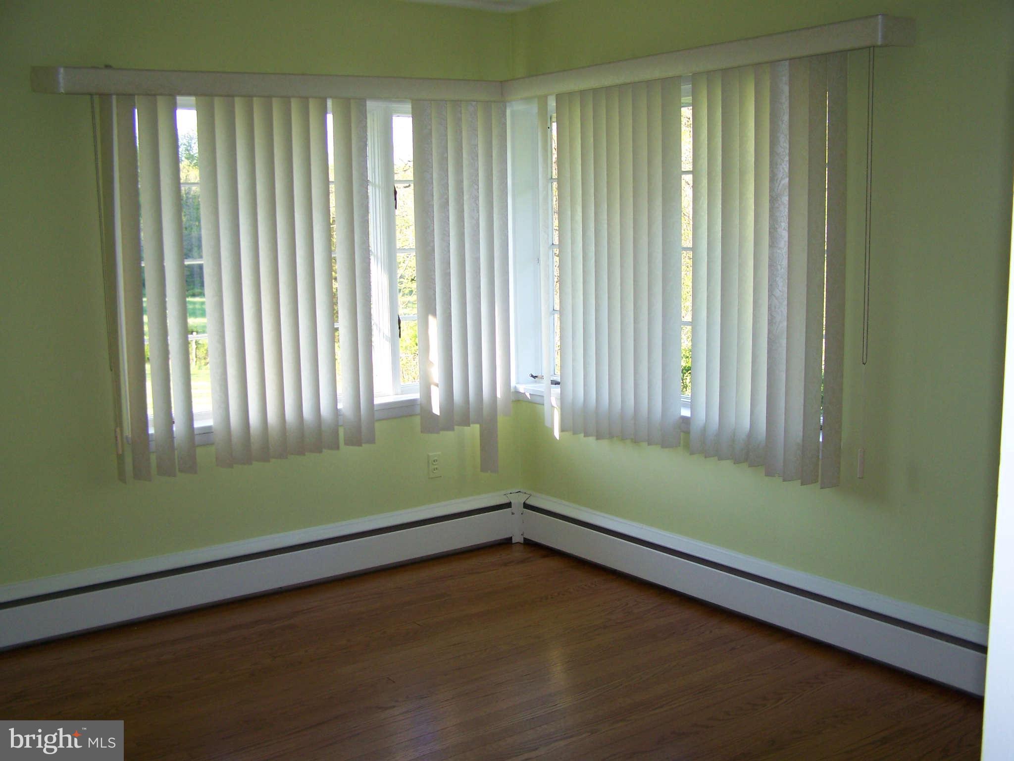 3117 Rices Lane Baltimore, MD 21244 - Photo 14 of 23 a view of a room with window and a bathtub