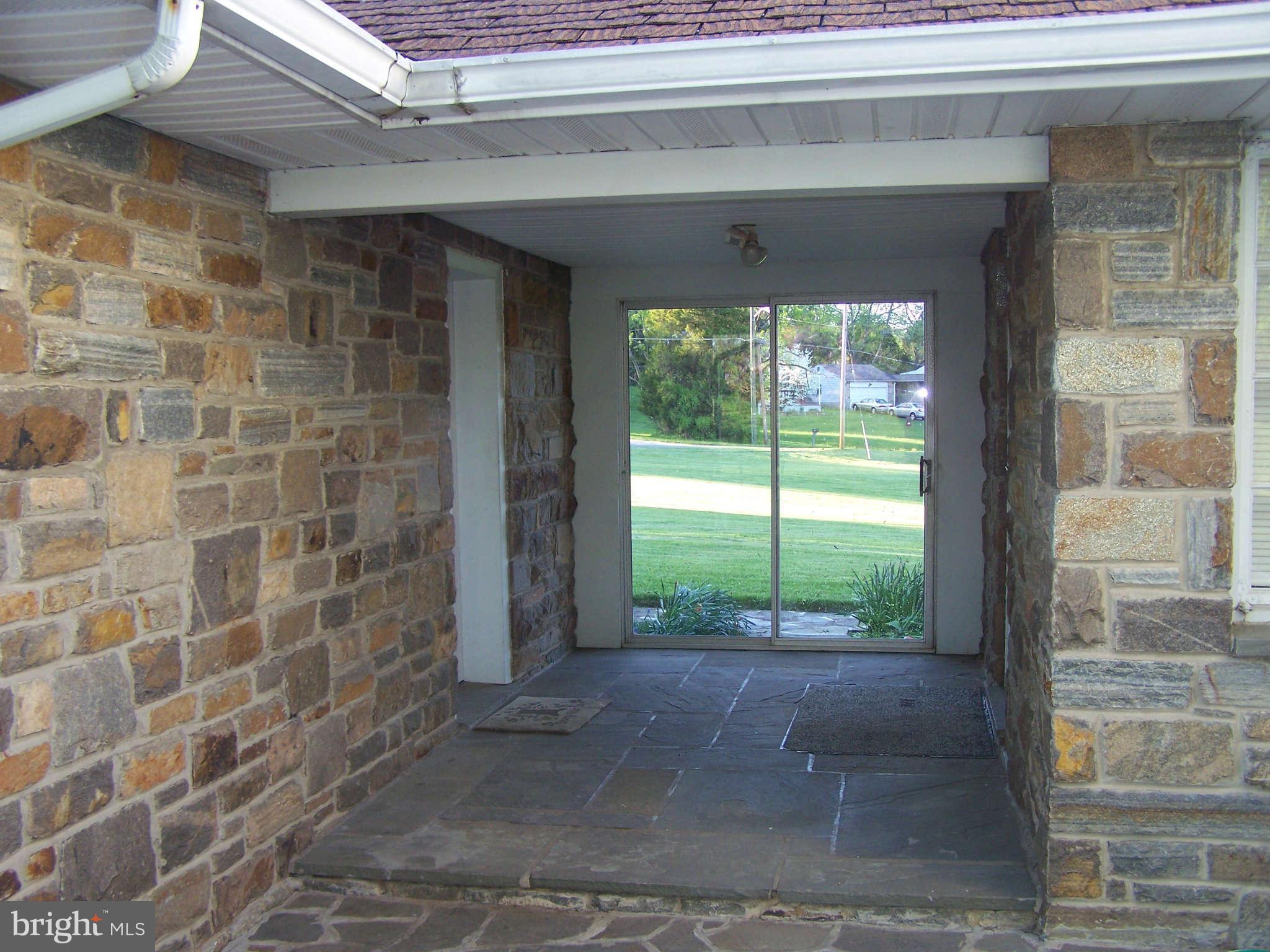 3117 Rices Lane Baltimore, MD 21244 - Photo 7 of 23 a view of a pathway both side of building
