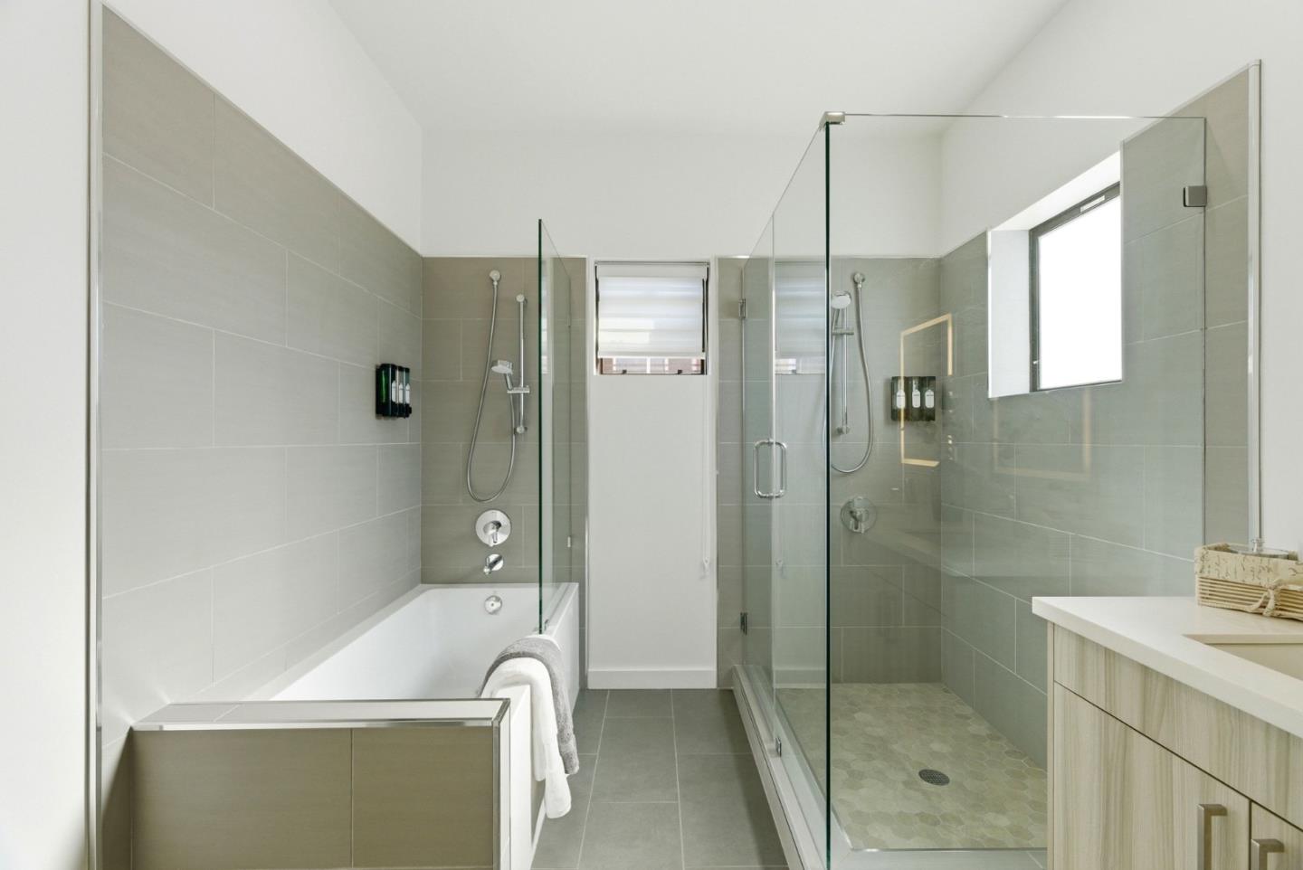 914 Woodside Road Redwood City, CA 94061 - Photo 25 of 39 a bathroom with a shower and a sink