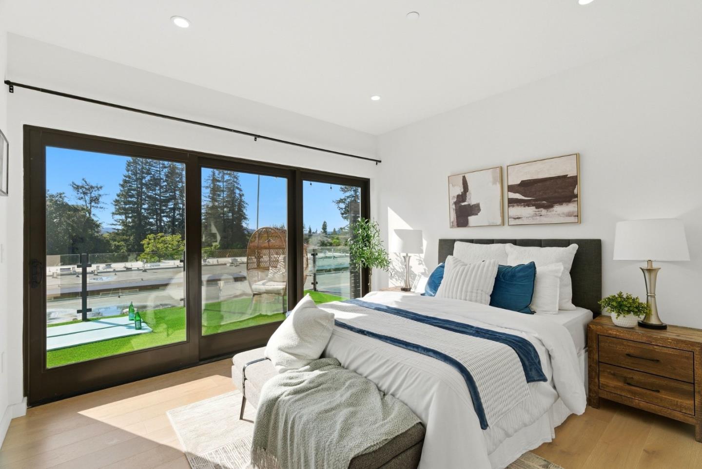 914 Woodside Road Redwood City, CA 94061 - Photo 27 of 39 a bedroom with a large bed and a large window