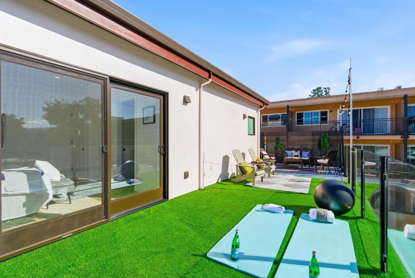 914 Woodside Road Redwood City, CA 94061 - Photo 31 of 39 a view of an house with backyard porch and furniture