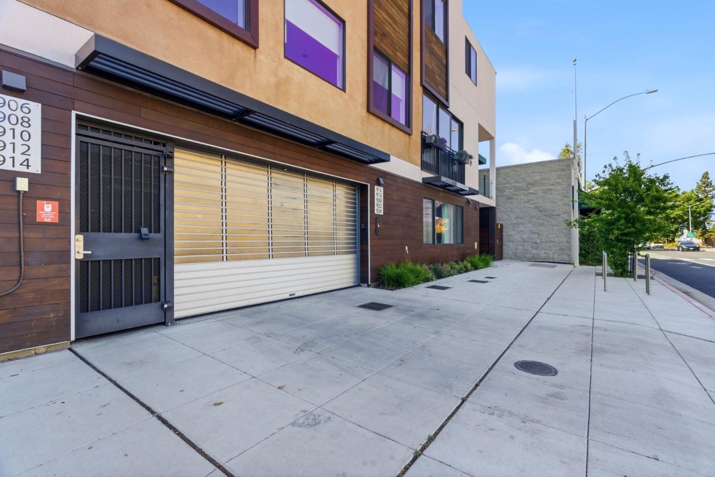 914 Woodside Road Redwood City, CA 94061 - Photo 6 of 39 a view of a pathway along the building