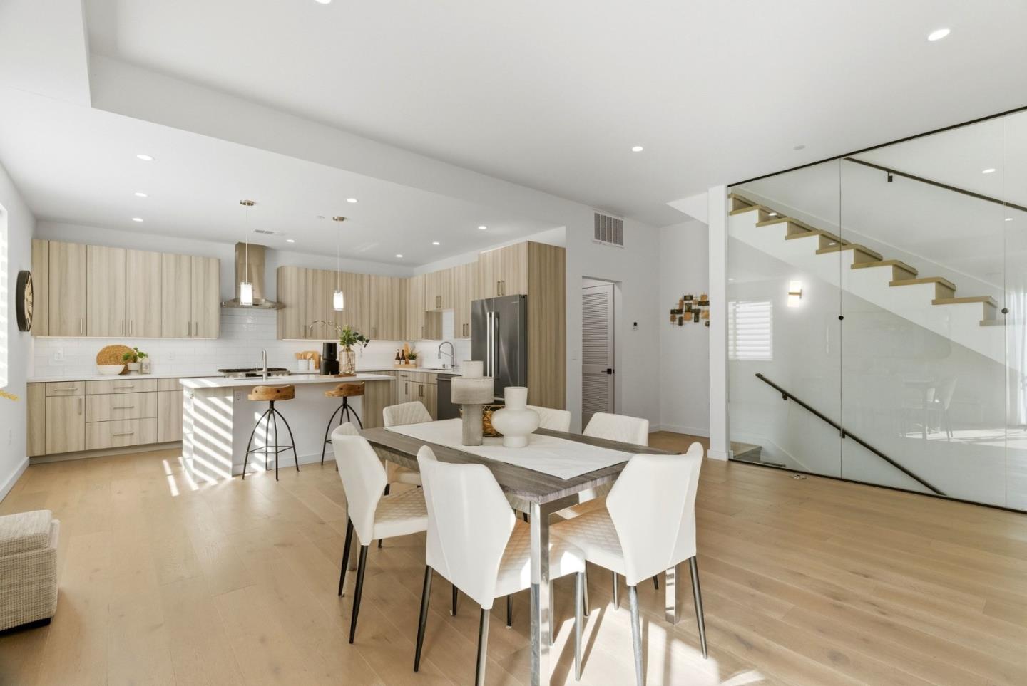 914 Woodside Road Redwood City, CA 94061 - Photo 10 of 39 a large kitchen with a table and chairs