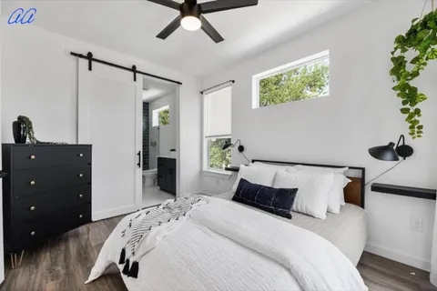 a view of living room with a sink and chandelier