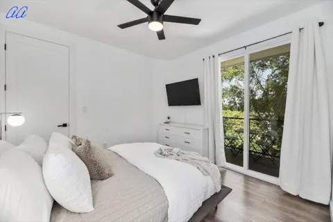 a view of livingroom with furniture and wooden floor