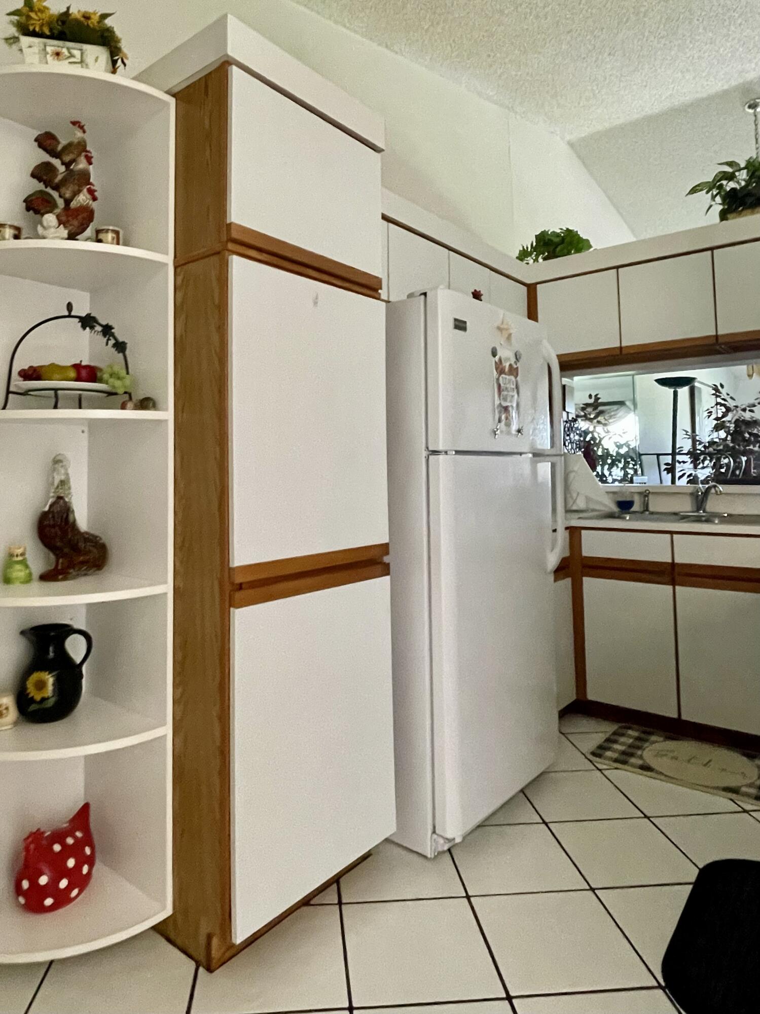 1072 Keystone Drive, Unit D Jupiter, FL 33458 - Photo 9 of 28 FullSizeRender (33)