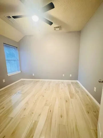 a view of an empty room and window