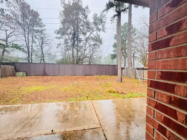 a view of back yard of the building