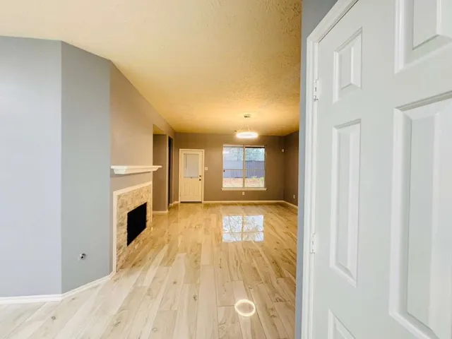 a bathroom with a tub and shower