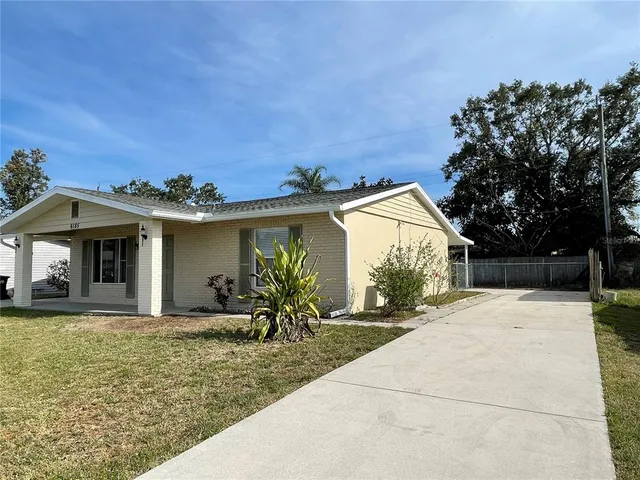 a house with trees in front of it