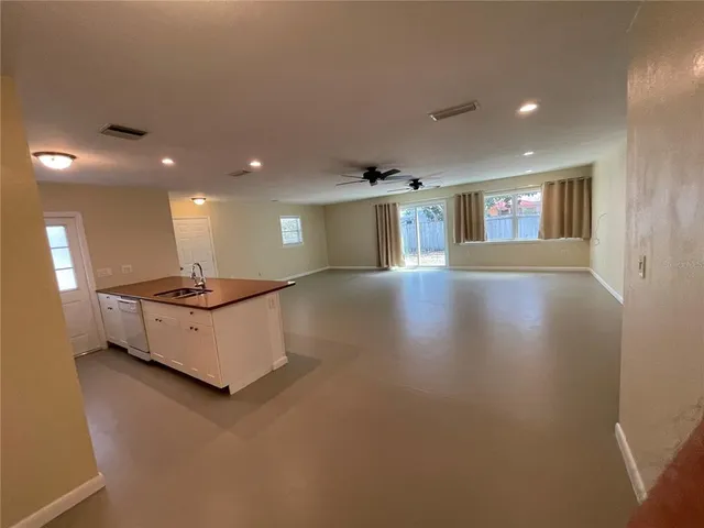 a bathroom with a toilet a sink and bathtub