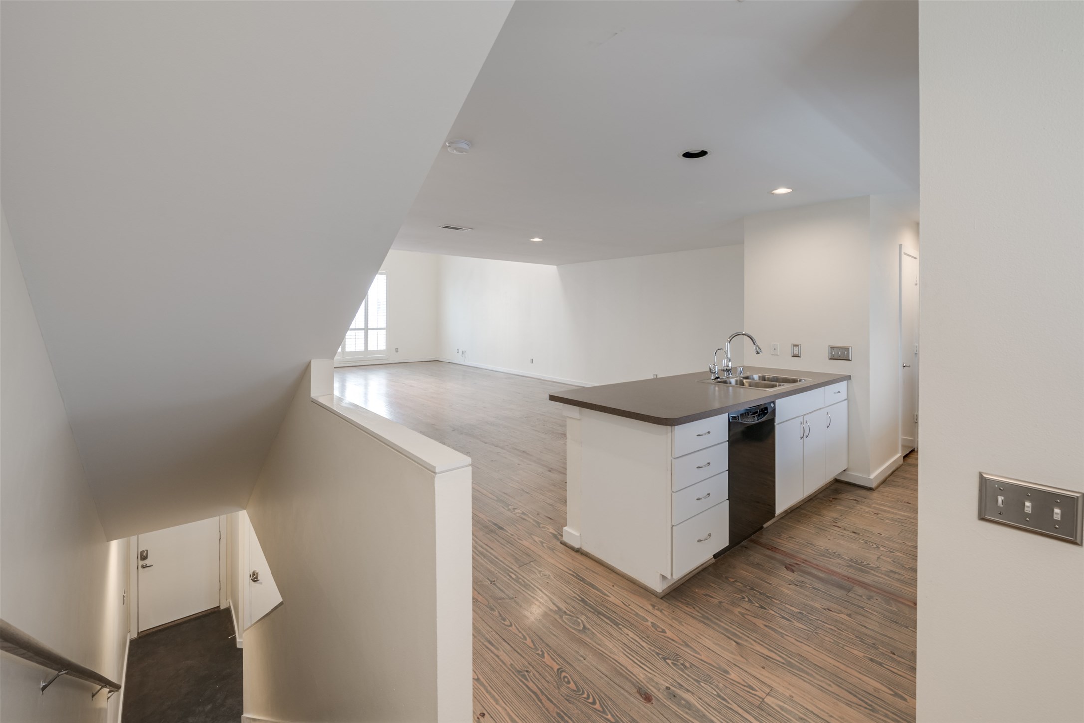 807 Robin Street Houston, TX 77019 - Photo 3 of 46 The second floor living/kitchen space is second to none, featuring hardwood floors, wide open spaces, soaring ceilings, and ample storage.