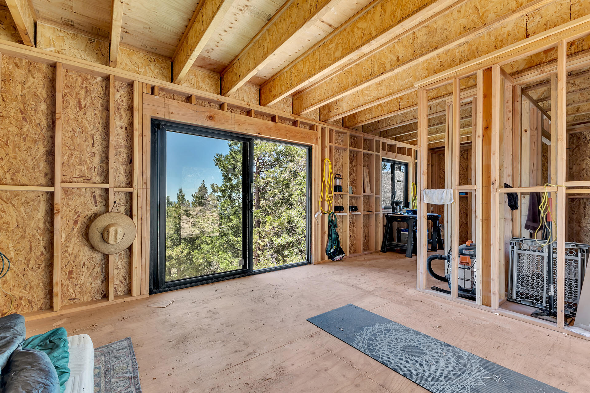 54174 North Ridge Drive Idyllwild, CA 92549 - Photo 16 of 33 a view of a room with wooden walls and stairs