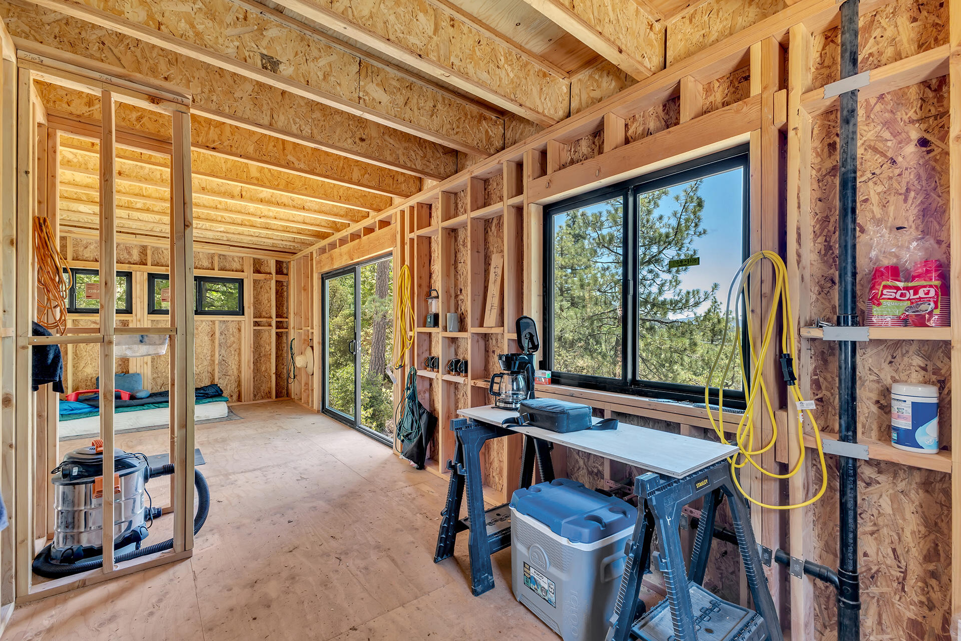 54174 North Ridge Drive Idyllwild, CA 92549 - Photo 20 of 33 a view of a porch with furniture and front door