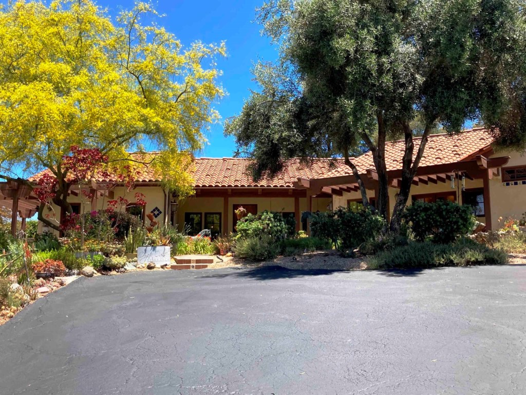 a view of a building with a garden