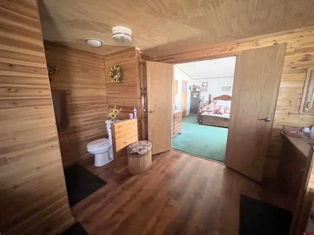 a view of a porch with wooden floor