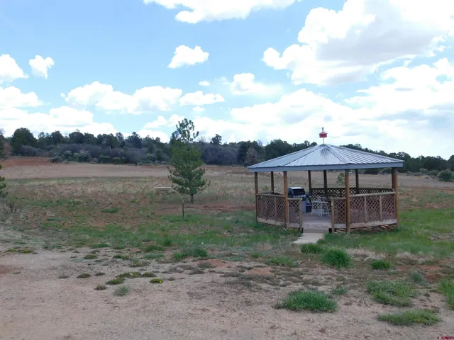 a view of a fireplace in a field