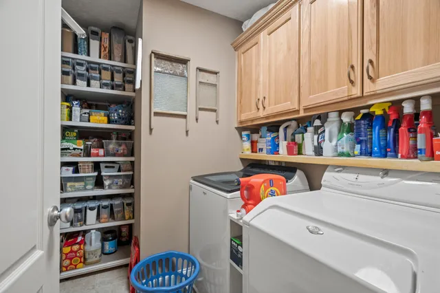 a room with furniture and a book shelf