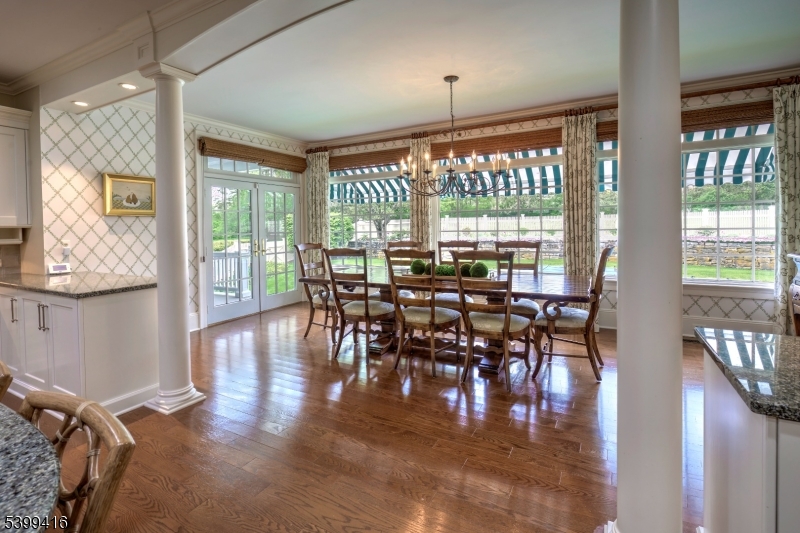 46 Sand Spring Road Morristown, NJ 07960 - Photo 16 of 38 a view of a dining room with furniture window and wooden floor