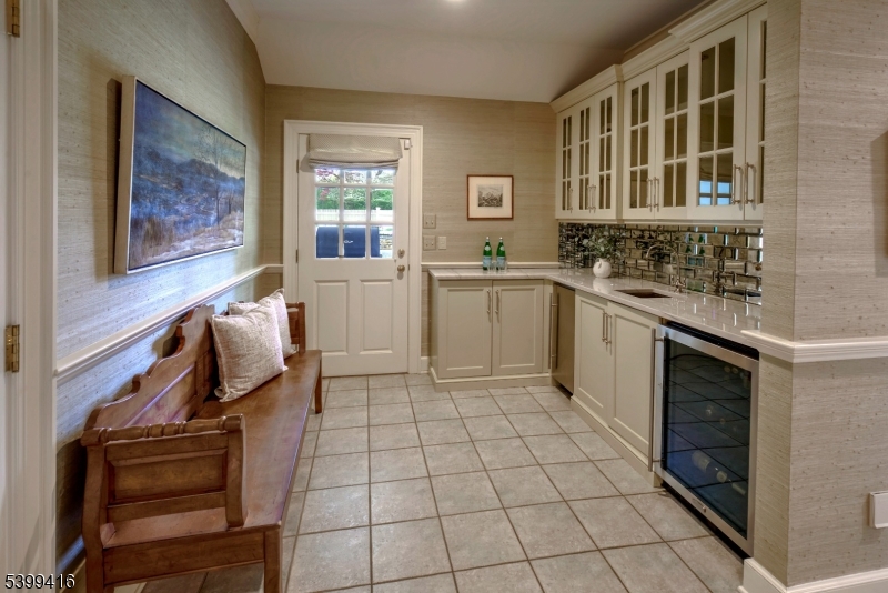 46 Sand Spring Road Morristown, NJ 07960 - Photo 17 of 38 a kitchen with a stove a sink and a microwave