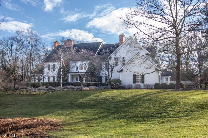 46 Sand Spring Road Morristown, NJ 07960 - Photo 3 of 38 a view of a house with a big yard and large trees
