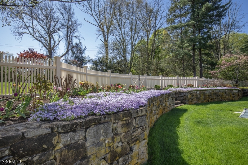 46 Sand Spring Road Morristown, NJ 07960 - Photo 32 of 38 a view of a garden with an outdoor space