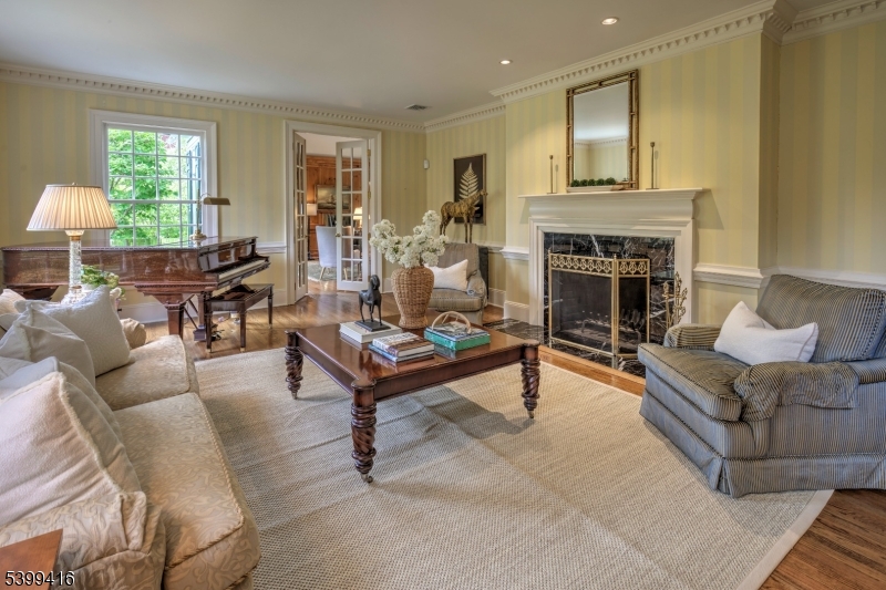 46 Sand Spring Road Morristown, NJ 07960 - Photo 8 of 38 a living room with furniture and a fireplace