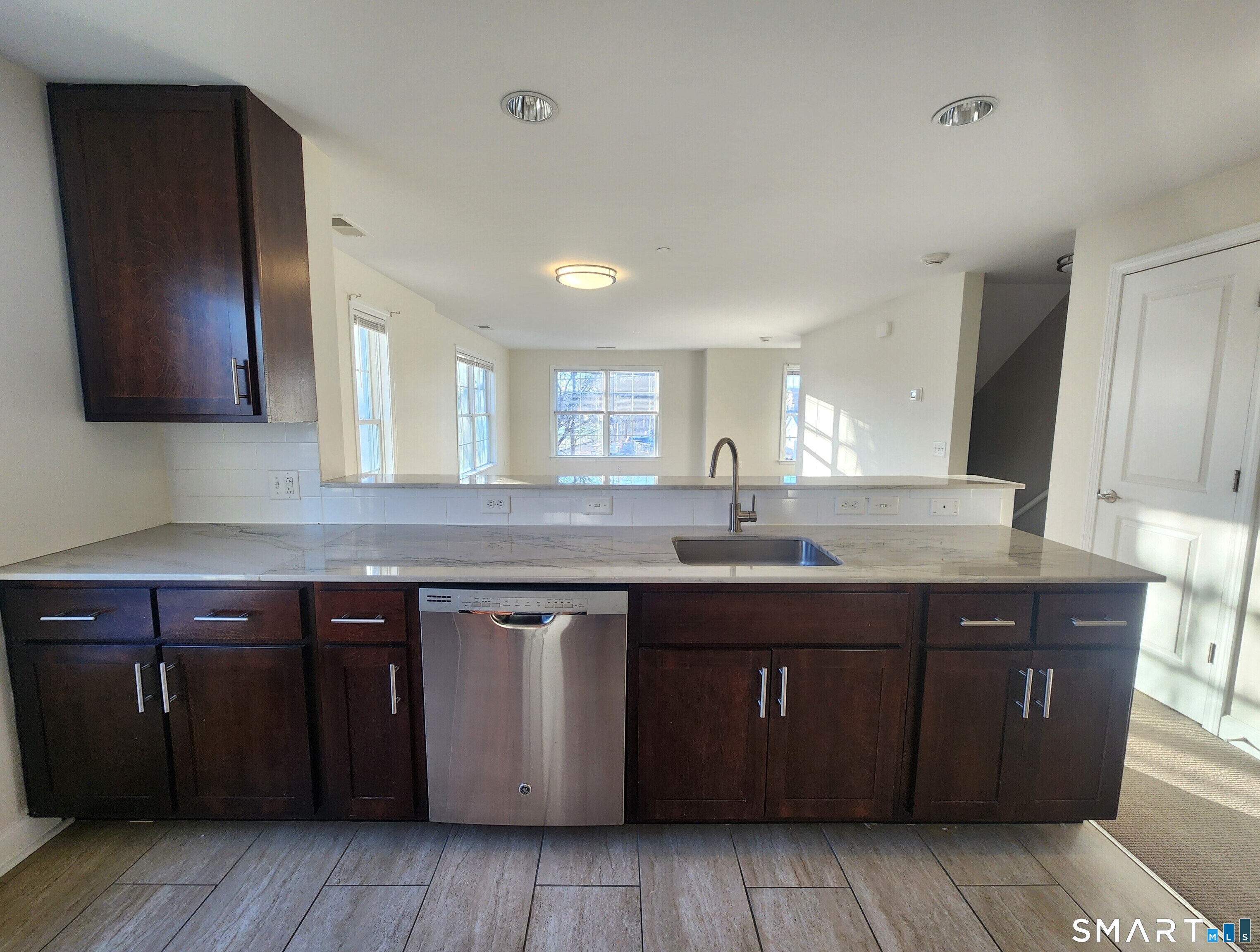 80 Merrell Avenue, Unit 80 Stamford, CT 06902 - Photo 5 of 14 Granite Counters, Open to Living Space