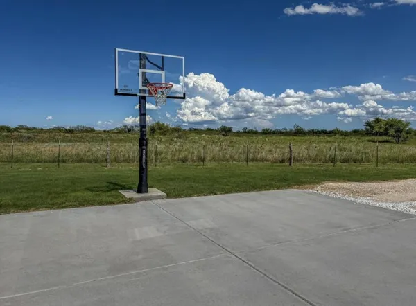 a view of a house with a big yard